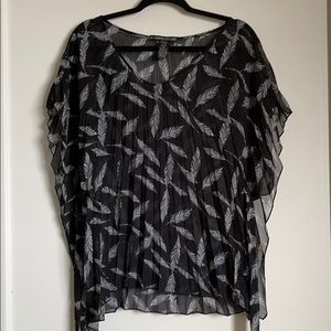 Loose fit, optional waist cinch blouse